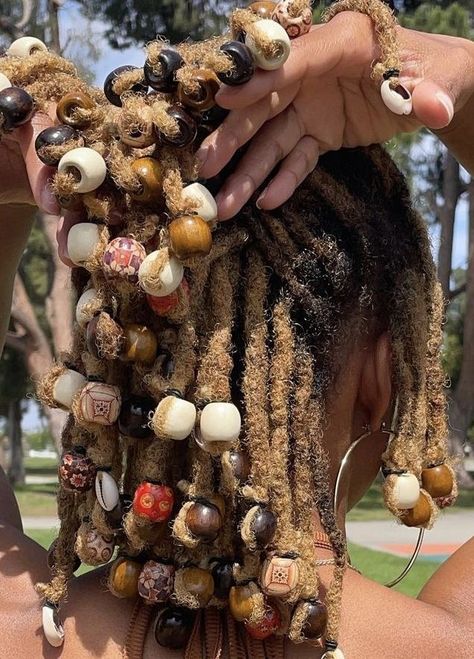 Afrocentric Loc Styles, Natural Locs With Beads, Loc Styles Beads, Beads On Dreads Locs, Locs With Beads And Shells, Loc Bead Styles, Locs With Layers, Earthy Locs, Shoulder Length Dreadlocks