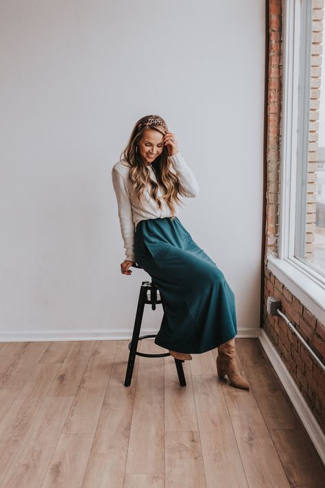 teal dress worn as a skirt with cream cable knit sweater and slouchy boots | merricksart.com #merrickwhitecollection #mwanywhere #womensdresses Teal Dress Boots, Boots For Maxi Dress, Winter Colour Outfits, Turquoise Skirt Outfit, Teal Skirt Outfit, Teal Outfit Ideas, Teal Dress Outfit, True Winter Outfits, Trendy Modest Outfits