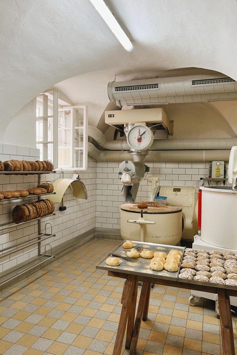 Transport your senses to the cozy ambiance of an artisan bakery in Salzburg, Austria with our charming European Bakery Art. This rustic bakery scene captures the essence of freshly baked bread and the inviting atmosphere of a café. Perfect for those who appreciate the beauty of artisanal bread displays. Explore our digital art print collection and add a touch of European bakery charm to your space. #CulturedandFermentedBreads European Bakery, Bread Photography, Bakery Aesthetic, Rustic Bakery, Bread Display, Bakery Art, Artisan Bakery, Opening A Bakery, Vintage Bakery