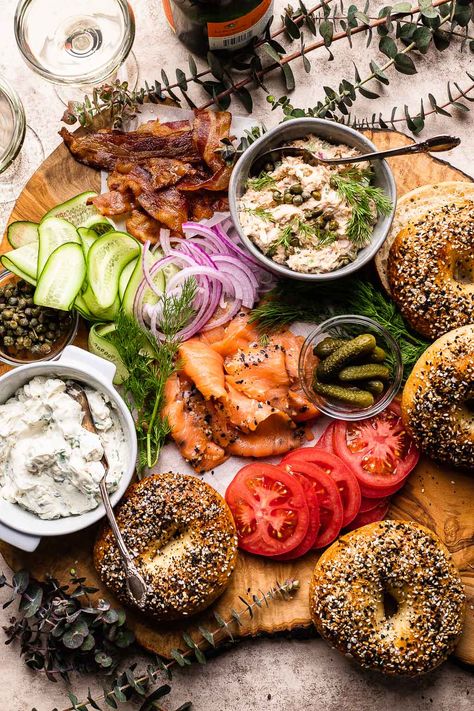 Indulge in a classic brunch favorite with a twist - a Smoked Salmon Bagel Board. Fresh bagels, schmear, smoked salmon, and all the toppings! Salmon Bagel Board, Bagel Board, Types Of Bagels, Smoked Salmon Spread, Bagel Bar, Smoked Salmon Bagel, Bagel Toppings, So Much Food, Salmon Bagel