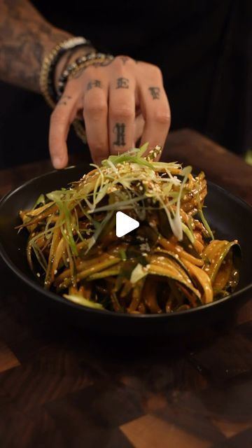 Chef Khristianne U on Instagram: "Cucumber Noodle Salad w/ Peanut Gochujang sauce 🥒🥜 Full Recipe Below in caption. 

2 Cucumbers 
2 tbsps smooth peanut butter (sub for tahini)
1 tbsp gochujang paste
1 tsp. Minced garlic
1 tsp chili garlic crisp 
1 1/2 tsp soy sauce
1 tbsp. honey
1 Tbsp rice vinegar
2-3 tbsps hot water 
1 Tbsp toasted sesame oil
4 green onion green, thinly sliced 
1 tsp toasted sesame seeds

	1.	���In your serving bowl, combine peanut butter, gochujang, soy sauce, sugar, hot water, chili garlic crisp, garlic and rice vinegar. Set aside. 
	2.	��Make the cucumber by using a Julienne peeler or a vegetable spiral slicer. Add the Cucumber to the peanut dressing  and add sesame oil, stir to coat the noodles and top with green onion and toasted sesame seeds. Devour!

#cucumber # Spiraled Cucumber Salad, Gochujang Salad Dressing, Cucumber Noodle Salad, Gochujang Paste, Cucumber Noodles, Peanut Salad, Julienne Peeler, Toasted Sesame Oil, Smooth Peanut Butter