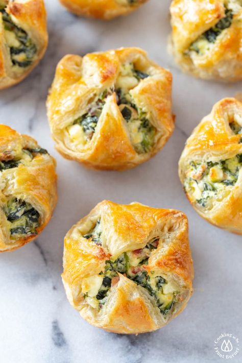 These Feta Spinach Bacon Puffs are the perfect party appetizer. A creamy filling with salty bacon and tangy feta is nestled in crispy, flaky puff pastry made easy in a muffin tin! #appetizer #puffpastryrn Spinach Feta Puff Pastry, Feta Puff Pastry, Bacon Puffs, Puff Pastry Recipes Appetizers, Easy Puff Pastry Recipe, Vegetarian Lunch Ideas, Spinach Puff Pastry, Game Night Food, Spinach Puff