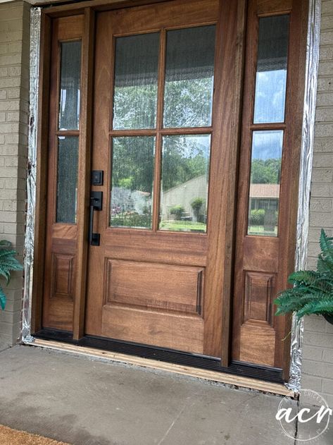 Wood Door Main Entrance, Big Wood Front Door, Door With Sidelight, Farmhouse Wood Front Door, Farmhouse Front Door Stain Colors, 3/4 Glass Door, Dark Grey House Wood Door, Side Entry Front Door, Fir Front Door Stain