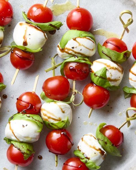 Caprese Skewers Recipe (with Balsamic Glaze) | The Kitchn Caprese Appetizer Bites, Mini Caprese Skewers, Tomato And Mozzarella Appetizer, Skewer Snacks, Caprese Skewers Appetizers, Host Recipes, Caprese Cups, Bbq Appetizer Ideas, Skewers Appetizers