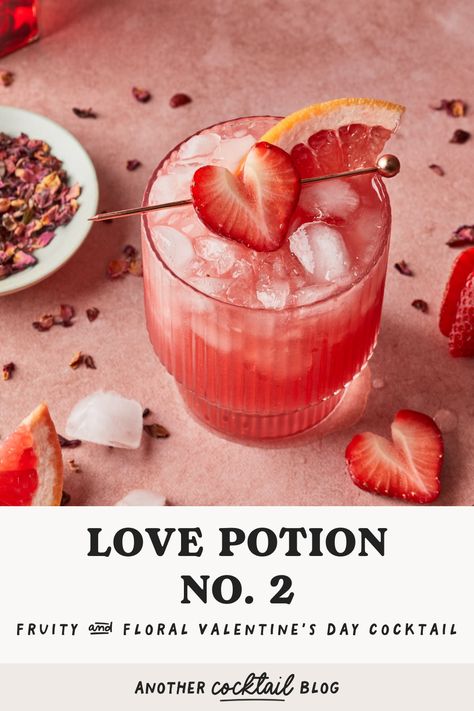 Raise you glass and get romantic with this refreshing love potion cocktail made with a mesmerizing blend of grapefruit juice, strawberry puree and sweet hibiscus syrup. Make this for your special someone this Valentine's Day, or share it with friends at your Galentine's celebration. Valentines Drink Photography, Part Time Lover Cocktail, Love Potion Drink Cocktails, Gin Valentines Cocktail, Love Themed Cocktails, Strawberry Puree Cocktail, Valentine Cocktails Easy, Romantic Party Ideas, Drink Content Ideas