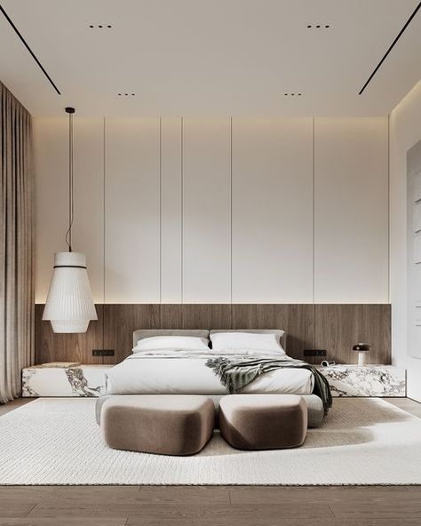 LEQB Architects* on Instagram: "Our QB/0263 master bedroom design is all about cozy vibes and smart lighting! Light walls, wood accents, and minimalist furniture create the perfect chill zone. Marble adds a touch of sophistication, while ceiling lights steal the show. The bed area gets a warm panel glow and a cool fabric pendant. Maximum comfort!   Impressed by what you see? QB hashtag reveals even more of our work.😍  Project: QB/0263 Room: Master bedroom Area: 41 sq.m. Furniture: @poliform_official bed / @flouspa pouf.  #leqb #leqbinteriors #qb0263" Hidden Bedroom Tv, Minimalist Ceiling Design, Bedroom Ceiling Design Modern Luxury, Minimalist Interior Design Bedroom, Leqb Architects, Minimalist Luxury Bedroom, Wood Panel Bedroom, Wood Walls Bedroom, Minimalist Bedroom Furniture