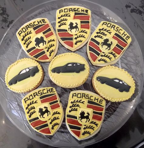 Porsche Emblem and Silhouette cookies! Cookies? Yes, cookies. Decorated with Royal Icing on sugar cookies, these Porsche designs were by far the most detailed cookies I have made yet! Porsche Themed Birthday Party, Mustang Cookies Decorated, Porsche Party Ideas, Porsche Cake Ideas, Porsche Cookies Decorated, Porsche Cookies, Cars Royal Icing Cookies, Classic Car Cookies Decorated, Porsche Cake