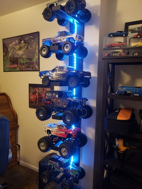 Big Truck Storage Kids Rooms, Rc Car Storage Ideas Diy, Rc Storage Ideas, Monster Jam Boys Bedroom, Monster Jam Kids Room, Boy Room Storage Ideas, Remote Control Car Storage, Rc Truck Storage Ideas, Toy Room Ideas For Boys