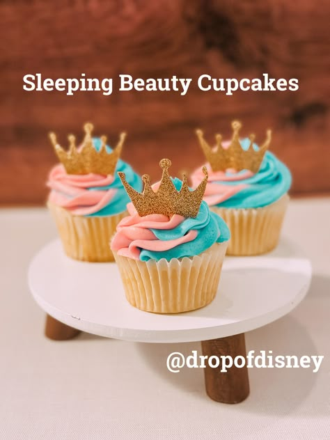 Celebrate World Princess Week with these Sleeping Beauty Cupcakes! These vanilla cupcakes are topped with a swirl of pink and blue frosting and a golden crown! #disney #cupcakes #sleepingbeauty Sleeping Beauty Desserts, Sleeping Beauty Cupcakes, Aurora Cupcakes, Princess Snacks, Sleeping Beauty Party Ideas, Sleeping Beauty Birthday Party, Beauty Party Ideas, Snack Bar Ideas, Sleeping Beauty Cake