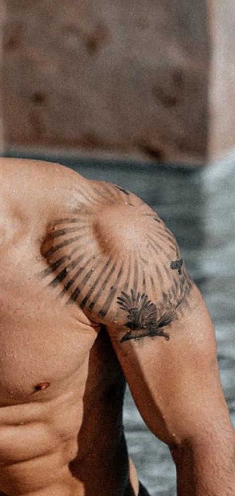 Shoulder Tattoo Men Aesthetic, Sun Rays Shoulder Tattoo, Shoulder Tattoo For Guys, Shoulder Tattoo Man, Man Shoulder Tattoo, Small Arm Tattoo Men, Men Rib Tattoo Ideas, Best Shoulder Tattoos Men Ideas, Cool Shoulder Tattoos For Guys