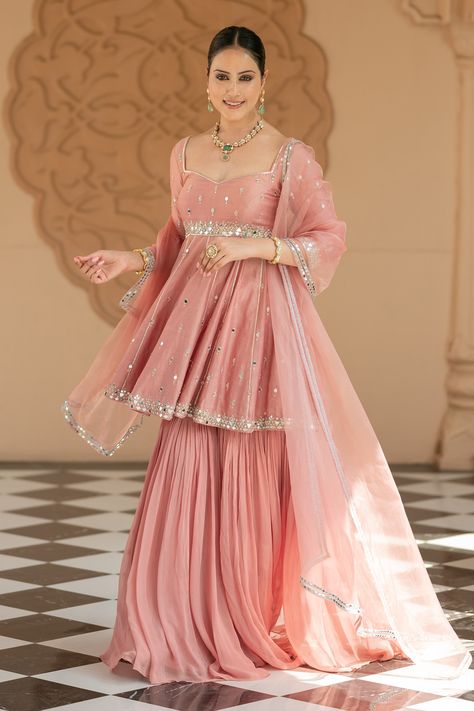 Shop for these amazing collections of Pink Semi Crepe Embroidered Mirror Sweetheart Peplum Kurta Sharara Set For Women by Esha Koul online at Aza Fashions. Sharara Hand Design, Sharara Simple Designs, Kurta Sets For Women Wedding, Anarkali Sharara Suits, Sharara Sleeves Design, Kurta Lehenga Designs, Sharara Set For Women, Sharara Kurta Designs, Pink Suits Women Indian