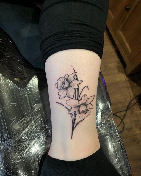 Orchid And Daffodil Tattoo, Daffodil Tattoo On Hand, Daffodil Tattoo Shaded, Masculine Daffodil Tattoo, Black And Grey Daffodil Tattoo, Daphodil Tattoos, Daffodil Tattoo Leg, Two Daffodils Tattoo, Daffodil Tattoos For Women