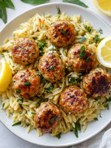 Greek Chicken Meatballs with Lemon Orzo | Cocina Republic Mia Recipes Greek Chicken Meatballs With Homemade Tzatziki Sauce, Easy Greek Chicken Meatballs With Lemon Orzo, Orzo With Meatballs, Mediterranean Chicken Meatball Bowl, Chicken And Feta Meatballs, Greek Lunch Recipes, Healthy Orzo Recipes Clean Eating, Greek Turkey Meatballs With Orzo, Greek Chicken Meatballs With Orzo