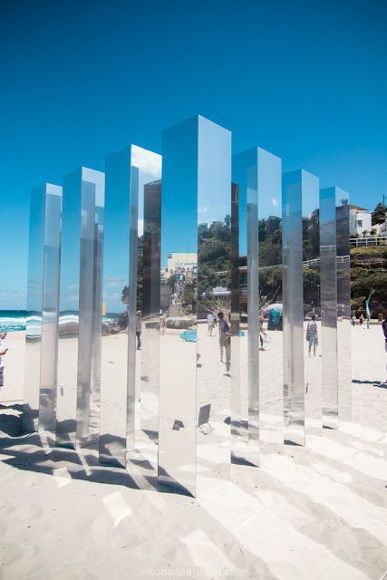 Outdoor exhibit, transformation, discovery, change in idea of space, walk in and out of GS and affect company, different materials, reflective, mirror outside - wood inside, color / fabric in the core; Kaleidoscope cube so Bondi Beach, Aust., by Alex Ritchie Cube Sculpture, Interaktives Design, Sea Sculpture, Art Making, Art Minimaliste, Sculpture Installation, Light Installation, Mirror Art, Outdoor Art