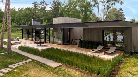 This Glass Cabin Appears Barely There on the Shores of Lake Minnetonka - Dwell Rancher Homes, House On The Water, Glass Cabin, Clad Home, Lake Minnetonka, Minnesota Home, Wood Cladding, Timber Cladding, Timber House