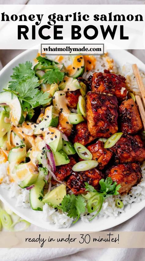 This easy salmon rice bowl recipe features flakey salmon coated in a honey garlic sauce nestled in coconut rice with Asian-inspired toppings. The spicy mayo and coconut rice are what make this salmon bowl stand out from the rest! Did I mention it cooks in 8 minutes? It's one of my favorite healthy recipes! Baked in the air fryer, these salmon bites are glazed to perfection. Use tamari, coconut aminos, or soy sauce in the marinade! Primal Kitchen Salmon Bowl, Salmon Meal Prep For The Week, Salmon Sticky Rice Bowl, Salmon And Cilantro Lime Rice, Sushi Bowl Recipe Salmon, Salmon Burger Bowl Recipe, Low Cal Salmon Dinner, Gf Df Salmon Recipes, Cooked Salmon Sushi Bowl