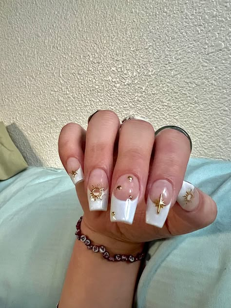 White Nails With Gold Cross, French Nail Designs With Gold, Nail Designs With Gold Charms, White French Tip Gold Accent, Gold Star Nails Acrylic, White French Tip Nails With Gold Charms, French White Nails Design, Short French Nails With Charms, White French Tip With Gold Charms