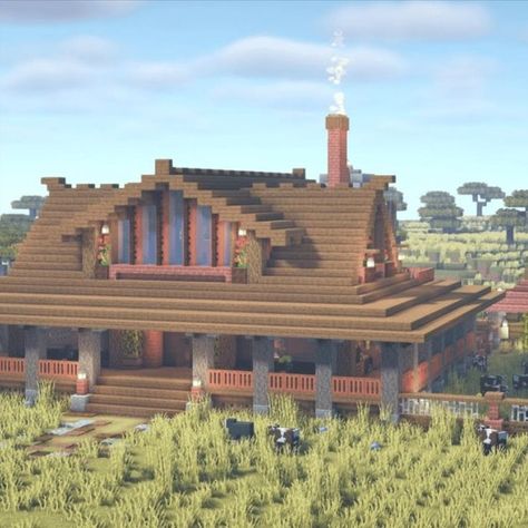 One of the most well-known ranch house ideas is this Country Style Ranch House. It displays a beautiful and large farmhouse in the countryside style that is completely furnished with a built-in animal pen and other farming-related conveniences. Ranch Style Minecraft House, Minecraft Country House Ideas, Minecraft Pig Pen Design, Minecraft Cattle Ranch, Minecraft Horse Ranch Ideas, Minecraft Ranch House Ideas, Country Minecraft House, Western House Minecraft, Minecraft Large House Ideas