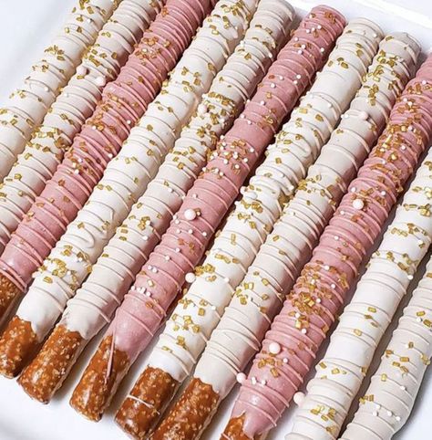 Strawberry Dipped Pretzels, Pretzel Rods Dipped Wedding, Chocolate Strawberries And Pretzels, Pretzel Dip In Chocolate, Pink And Gold Chocolate Covered Pretzels, Birthday Pretzel Treats, Wedding Pretzels Rods, Pretzel Sticks Dipped In Chocolate Pink, Pink White And Gold Chocolate Covered Pretzels