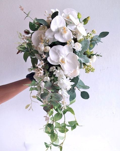 Orchid Eucalyptus Bouquet, Fall Wedding Flowers November White, Small Cascading Bouquet, Cascading Wedding Bouquets Orchids, Diy Cascading Bridal Bouquets, Magnolia Bridal Bouquet, White Lilium, Orchid Wedding Theme, White Orchid Bouquet