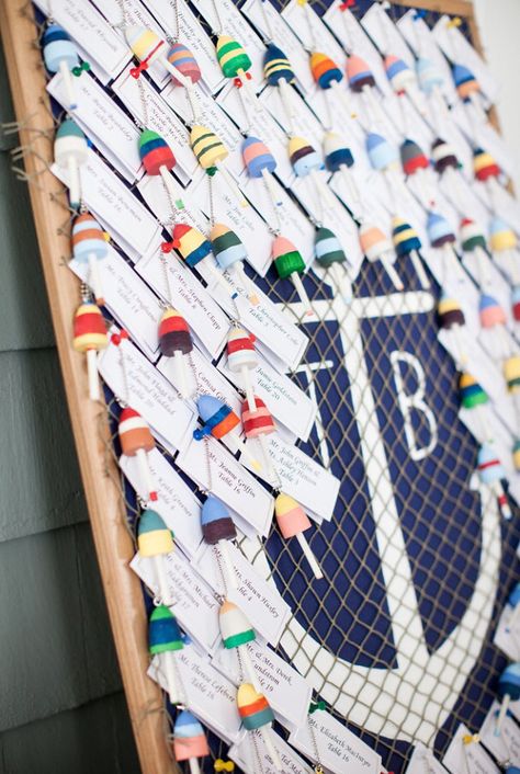 Nautical wedding place settings for guests. Hand painted mini buoys for guests to have as ornament/keychain keepsakes hung on a painted cork board. Inspired by Pinterest Table Assignments Wedding, Painted Cork Board, Provincetown Massachusetts, Edgy Bridal, Carmel Weddings, Beach Wedding Centerpieces, Table Assignments, Wedding Shower Favors, Wedding Place Settings