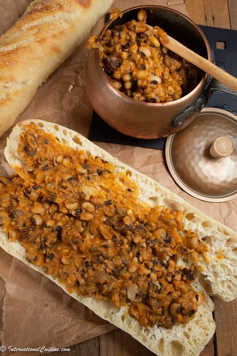 Ndambe is a delicious spicy bean sandwich. It is found all over as a street food in Senegal.  You will love this recipe. #ndambe #senegalesecuisine #senegal Senegalese Recipes, Senegalese Food, Bean Sandwich, Senegalese Recipe, West African Recipes, West African Food, Vegetarian Italian, African Cooking, African Recipes