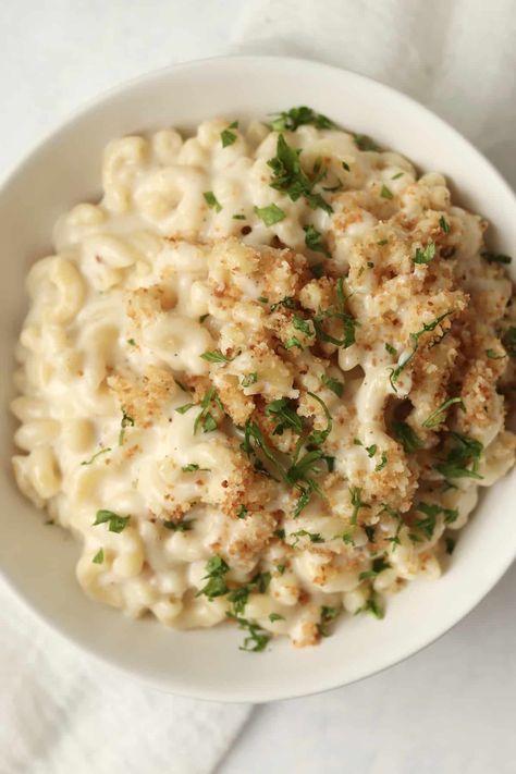 White Cheddar Mac and Cheese is extra cheesy, rich, and easy to make on the stovetop! Start by making an easy white cheese sauce then top the cheesy noodles with crispy Panko Breadcrumbs. Mac And Cheese White Sauce, Cpk Macaroni And Cheese, Best White Cheddar Mac And Cheese, Cornflake Mac And Cheese, Crockpot White Cheddar Mac And Cheese, White Mac N Cheese Recipe, White Cheddar Baked Mac And Cheese, Bechamel Mac And Cheese, White Cheese Mac And Cheese