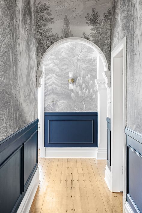 Muted hues and a statement arch are an elegant touch to this bedroom. Blue Hallway Wallpaper, Dramatic Hallway, Porters Paints, Arch Opening, Detailed Wallpaper, Cleaning Hacks Bedroom, Wallpaper Hallway, Blue Hallway, Hall Ideas