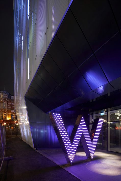 Image 2 of 9 from gallery of W London Leicester Square / Jestico + Whiles. Courtesy of  jestico + whiles Hotel Signage, Entrance Signage, Hotel Kuala Lumpur, Glamorous Interiors, Signage Signs, Hotel Entrance, Building Signs, London Pictures, Environmental Graphic Design