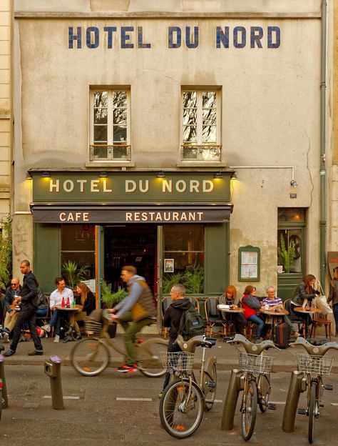 Hôtel du Nord on the banks of the Canal St. Martin in Quartier de L'Hopital-Saint-Louis, Paris, IIe-de-France_ France Canal St Martin, Secret Paris, St Martin, Drama Film, Saint Martin, At The Hotel, Cafe Restaurant, New New, St Louis