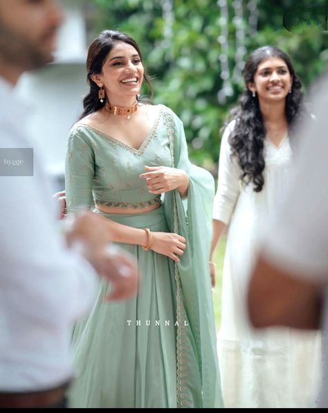 Wedding Wear Lehenga, Indian Christian Engagement Outfit, Kerala Wedding Lehenga, Pastel Color Half Saree, Engagement Christian Dress, Kerala Wedding Dress For Cousins, Skirt And Top Ideas For Wedding, Wedding Fixation Dress Kerala, Wedding Skirt And Top Indian