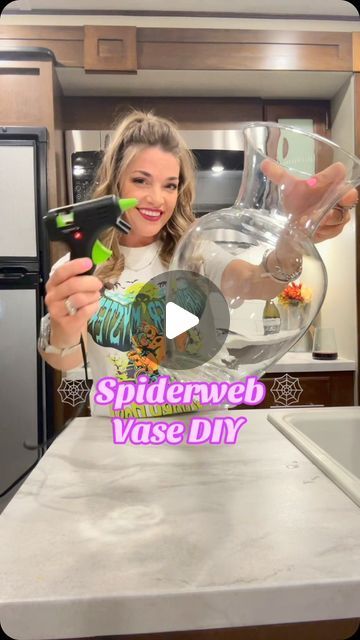 Amanda Jean Gilmore on Instagram: "Transforming my home into a haunted haven with this DIY spiderweb vase that lights up! 🕷️✨ Perfect for adding a touch of spooky elegance to any room. Who says Halloween has to wait until October? 👻🕸️ I got all my supplies at @Dollar Tree  and @Walmart and my shirt is from @Five Below happy#Summerween #DIYMagic #SpookyVibes #LightUpCraft #CreepyDecor #CraftingFun #SpookySeason #HauntedVibes #HalloweenAllYear 🎃 💀 #SpookySeason #DIYCrafts #HauntedHouse #DollarTreeFinds #HalloweenDecor #CraftingFun #GetCrafty #dollartreediy #dollartree #craft #halloweencrafts #diys #happycrafting #dollartreefinds #SpookySeason #dollartree #halloween2024countdown #walmartcrafts" Diy Halloween Vase, Halloween Vases Diy, Halloween Vase Ideas, Dollar Tree Halloween 2024, Dollartree Halloween Decor Diy, Dollar Tree Halloween Diy 2024, Halloween Dollar Tree Crafts, Dollar Tree Diy Halloween Decor, Diy Halloween Decorations Dollar Tree