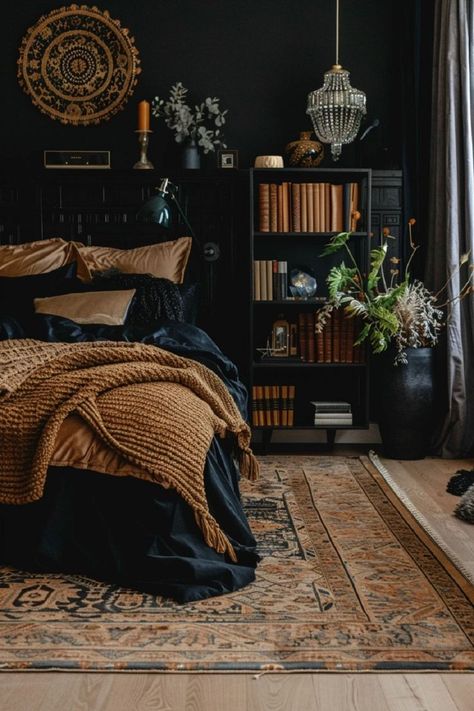 Lose yourself in the ethereal beauty of ebony in a boho bedroom hideaway where layers of texture and soft lighting create a cocoon of comfort and serenity, enveloping you in its soothing embrace.—click to get inspired! Black Bedding Room Ideas For Couples, Black Small Room Ideas, Black Bedroom Small Room, Black Boho Interior, Boho Mens Bedroom, Black And Jewel Tone Bedroom, Black Limewash Bedroom, Dark Wood And Black Bedroom, Gothic Master Bedrooms Decor