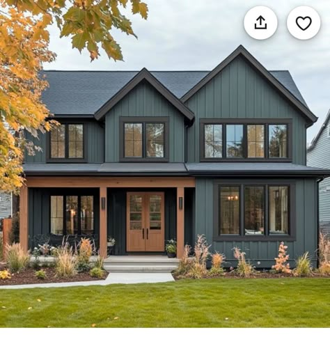 Dark Blue House White Windows, House Exterior Dark Blue, Teal And Black House Exterior, Dark Colored Exterior Houses, Dark Blue House With Cedar Accents, Dark Slate Blue House Exterior, Dark Blue Grey House Exterior, Black House Colored Door, Dark House Exterior With Wood Accents