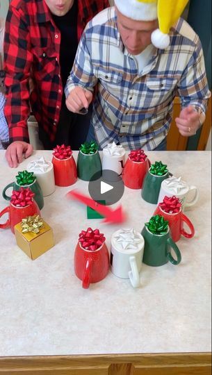 92K views · 1K comments | Mug Spinner Christmas Game ☕️ | Mug Spinner Christmas Game ☕️  Kids, Dad, and family play diy party game for Christmas with mugs, bows, and cheap candy prizes. Perfect family challenge... | By Benson Bros | Alright, so spin the spinner. Spin it. Okay, what did you get? Oh. $10. $10. Go for it. Spinach pad. Spinach. Go. Go. Oh. Look at this one. What is it? Oh. Oh. A can of tomato soup. Interesting. Alright. Go for it. You want to get the gold one because it has a special prize. Go for it. It's got a special prize. Gold. Oh. Oh. Looks like you got this white one. What is it? Oh. It's a Rudolph nose. Hey. Put it on. Okay, put it on. Oh, I Give me the gold. Oh. Oh right here. I need to get this one. What is it? Oh. Oh it's hot chocolate and marshmallows. Hot chocolat Christmas Game With Marshmallows, Christmas Prize Games For Family, Cheap Prizes For Christmas Games, Christmas Bow Spinner Game, Bow Spinner Christmas Game, Cup Game For Christmas, Christmas Games For Family With Solo Cups, Christmas Game Prizes Cheap, Christmas Diy Games