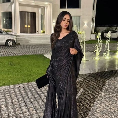 Moonlight glitter saree with black chiffon blouse is now available for customisation dm on @xarnish_store DM for order and details #bridalsarees #wedding #weddingdress #weddingphotography #weddingdress #haldiceremony #haldioutfit #haldi #haldijewellery #haldifunction #haldilook #haldibride #clothes #dressoftheday #ootd #outfit #instadaily #ethnicwear indianwear #instagood #instadaily #instalike #instagram #indianwedding #india #indianbride #indianfashion #festival #mehndi #mehndidesig... Black Glitter Saree, Moonlight Saree, Glitter Saree, Moonlight Dress, Glitter Blouse, Mehndi Outfits, Black Chiffon Blouse, Haldi Outfit, Fancy Sarees Party Wear