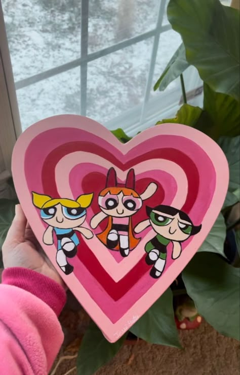 Powerpuff girls painting on heart shaled canvas Heart Shaped Painting Canvas, Painting On A Heart Shape Canvas, Painting Ideas Heart Canvas, Heart Canvas Ideas, Heart Shaped Painting Ideas, Painting On Heart Shaped Canvas, Heart Shape Canvas Painting, Heart Shaped Painting, Powerpuff Girls Painting