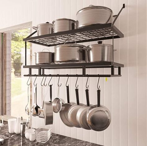 Cookware is cumbersome and difficult to store, so installing a system is essential for an efficient kitchen. Let's look at these Pots and Pans Organizer solutions. Here are 19 items for both cabinets and drawers. Pot And Pans Organization, Kitchen Wall Storage, Pan Storage, Kitchen Pans, Kitchen Wall Shelves, Pot Rack Hanging, Kabinet Dapur, Hanging Rack, Tidy Kitchen