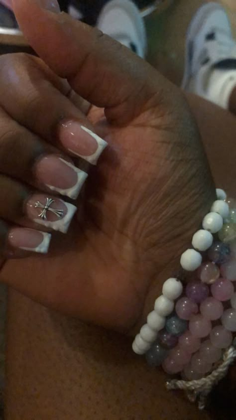 Short Nail Designs With Cross, French Tip Acrylic Nails With Cross, Short Acrylic Nails With Cross, Nail Inspo Cross Charm, French Tip Nails With Cross Charm, Cross Charm Nails Acrylic, Short French Tip Acrylic Nails With Charms, Short Nails With Cross Charm, French Tip With Cross Charm