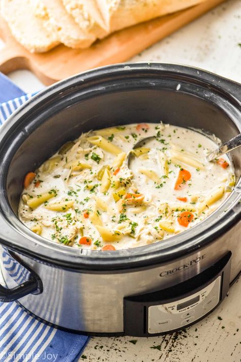 Our family loves this Creamy Crockpot Chicken Noodle Soup. It is the ultimate comforting winter soup. It is easy to make, but deliciously thick and creamy. Chicken Soup Crock Pot, Slow Cooker Tortellini Soup, Chicken Recipes Instant Pot, Creamy Crockpot Chicken, Crockpot Recipes Ground Beef, Easy Chicken Soup, Poached Chicken Breast, Chicken Breast In Air Fryer, Creamy Chicken Noodle