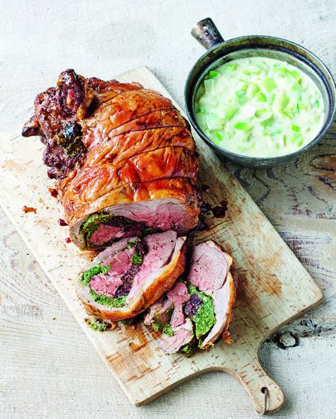 James Martin's stuffed leg of Welsh lamb with onion and leek sauce - delicious. magazine Stuffed Leg Of Lamb, Leek Sauce, Leftover Roast Lamb, Butterflied Leg Of Lamb, British Childhood, Welsh Food, Happy Easter Weekend, Lamb Leg Recipes, Welsh Recipes