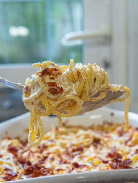 Stir in 2 cups of the mozzarella and 1/2 of the bacon. Season to taste with salt and pepper and transfer to a 9x13-inch baking dish. Top with remaining mozzarella and bacon and bake until cheese has melted and is starting to turn golden brown, about 15 minutes. Let Cream Cheese Baked Spaghetti, Baked Spaghetti Recipes, Cheese Baked Spaghetti, Cream Of Bacon Soup, Cream Cheese Spaghetti, Spaghetti Ingredients, Baked Spaghetti Recipe, Cheese Spaghetti, Bacon Soup