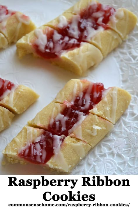 These rasoberry ribbon cookies are rich, buttery cookies are filled with seedless raspberry jam, and topped with a drizzle of icing. They're one of our favorite Christmas cookie recipes. Seedless Raspberry Jam, Make Mead, Ribbon Cookies, Favorite Christmas Cookies, Jam Bars, Low Sugar Jam, Raspberry Bars, Raspberry Cookies, Jam Cookies