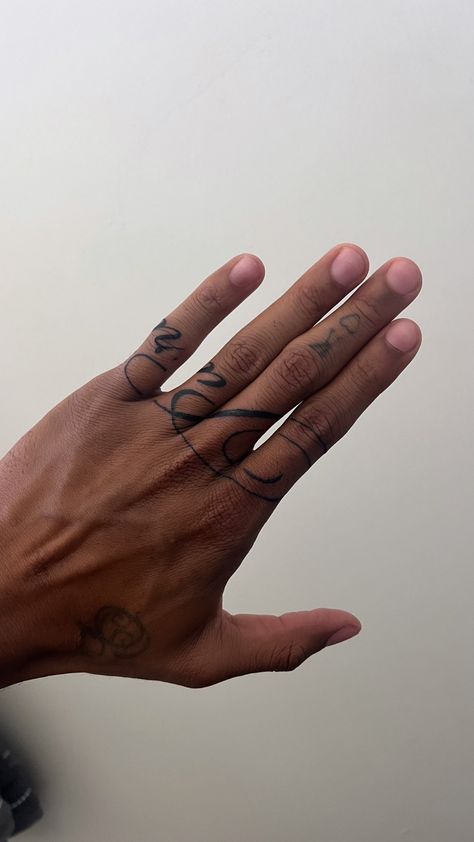 Where To Put Quote Tattoos, Pinky Tattoo Men, For Holding Hand Tattoo, New York Times Font Tattoo, Cursive Finger Tattoo, J Hand Tattoo, 222 Finger Tattoo, Neck Tattoo Dainty, Men’s Full Finger Tattoos