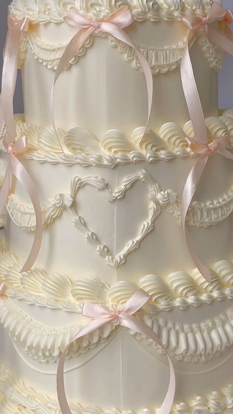 April’s Baker | Is this the ultimate coquette wedding cake?🤍🎀 | Instagram Coquette Wedding Venue Aesthetic, 1980s Wedding Cake, Taylor Swift Wedding Cake, Vintage Bridal Shower Cake, Vintage Tiered Cake, Coquette Wedding Cake, Wedding Cakes Aesthetic, 90s Wedding Cake, Cherub Cake