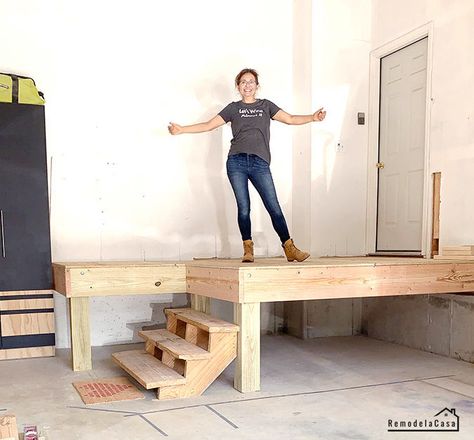 How to build a garage platform - #thdprospective Entryway Stair Storage, Steps Into House From Garage, Garage Entry Steps, Garage Conversion To Laundry Room, Garage Steps Into House Diy, Steps Going Into House From Garage, Garage Stairs With Landing, Steps In Garage To House, Build Laundry Room In Garage