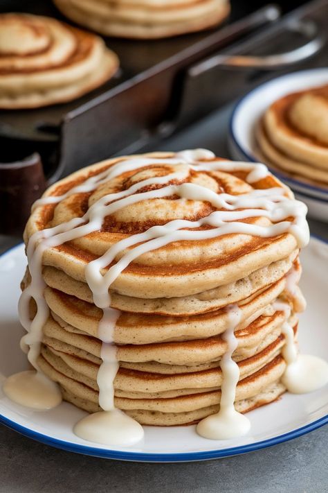 Wake up to the irresistible aroma of freshly baked cinnamon rolls—now in pancake form! Our Ultimate Guide to Cinnamon Roll Pancakes will take your breakfast experience to a whole new level, combining fluffy pancakes with a rich cinnamon swirl. Are you ready to dive into this sweet culinary adventure? Let’s get flipping! Cinnoman Roll Pancake Recipe, Cinnamon Bun Pancakes, Cinnamon Swirl Pancakes, Veggie Sushi Rolls, Cinnamon Pancakes Recipe, Cinnamon Roll Pancakes Recipe, Pancakes Cinnamon, Veggie Sushi, Thanksgiving Breakfast