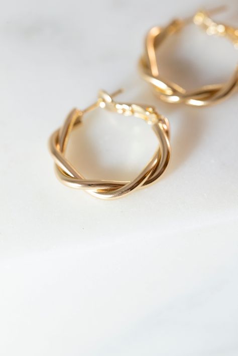 [PaidLink] Our Dainty Twisted Hoop Earrings Are A Perfect, Minimalist Earrings To Add To Any Outfit! Made With 14K Gold Filled Metal, And Measure 27Mm X 28Mm. Available In Gold. Lead And Nickle Free. #goldminimalistjewelry Twisted Gold Hoop Earrings, Pretty Jewellery Earrings, Gold Hoop Earrings Aesthetic, Trendy Gold Earrings, Everyday Gold Jewelry, Small Business Women, Gold Minimalist Earrings, Minimalist Gold Jewelry, Minimalist Jewelry Gold