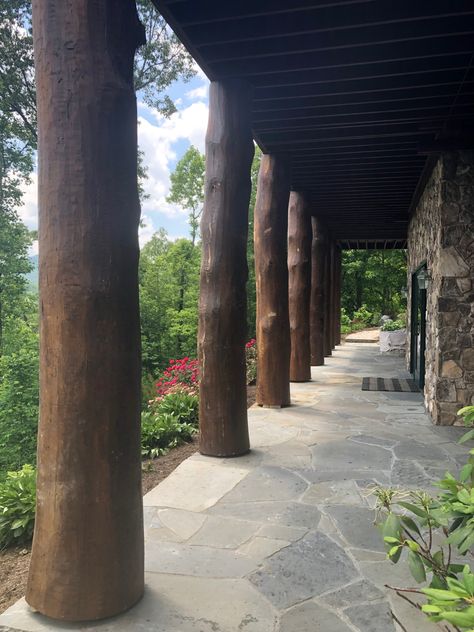 Natural peeled log posts used as front porch columns. Log Porch Posts, Timber Posts Front Porches, House Pillars, Rustic Front Porch, Porch Trees, Front Porch Columns, Deck Supports, Terrace Garden Design, Timber Posts