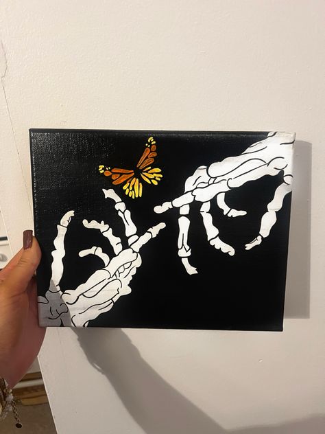 skeleton, butterfly, hands, hand-painted, canvas, canvas painting, halloween, halloween art, trendy, artsy, painting Dark Paintings On Canvas, Split Canvas Painting Ideas, Painting Ideas On Canvas Butterfly, Painting Ideas Meaningful, Skeleton Hand Painting, Witchy Painting Ideas, Canvas Painting Halloween, Butterfly Hands, Skeleton Painting